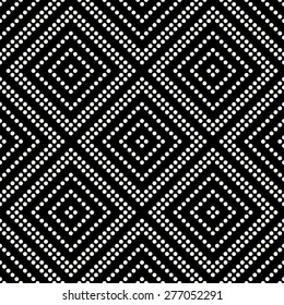 Seamless geometrical pattern with Rhombus of circles on a black background. Vector illustration.