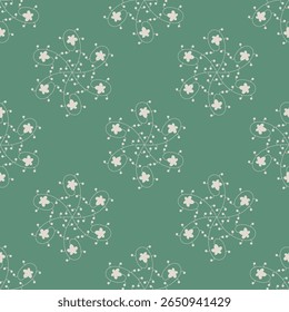 Seamless geometrical pattern with round floral mandalas. White silhouettes on green background.