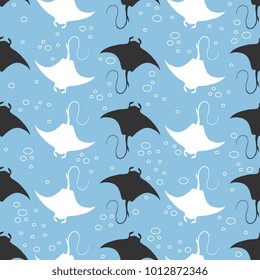 Seamless geometrical pattern with silhouettes of stingray fish.
