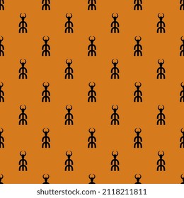 Patrón geométrico sin foco con pequeñas siluetas de dios cuerno pagano. Baal Hadad. Hombre con la cabeza de toro. Diseño de Halloween naranja y negro.
