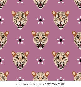 Seamless geometrical pattern with stylized faces of leopard or jaguar and abstract floral polka dots. Cartoon style.