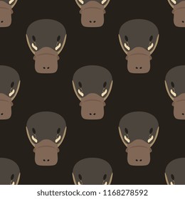 Seamless geometrical pattern with stylized heads of Platypus. Flat cartoon style.