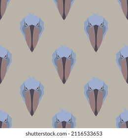 Seamless geometrical pattern with stylized heads of African bird Shoebill or Whalehead. (Balaeniceps rex). On gray background.