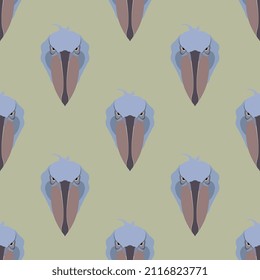 Seamless geometrical pattern with stylized heads of African bird Shoebill or Whalehead. (Balaeniceps rex). On light green background.