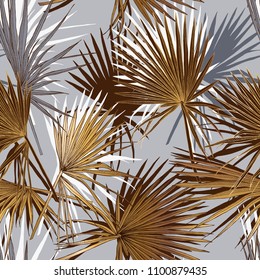Seamless gold and silver pattern. Tropical leaves. Exotic fan palm. Vector illustration.