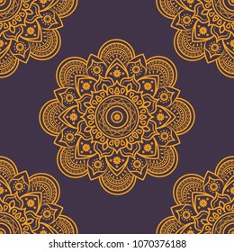 Seamless golden mandala pattern on violet background
