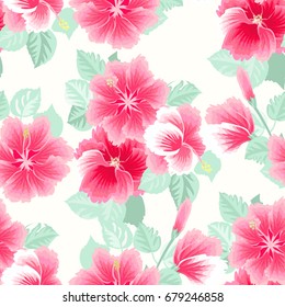 Seamless gorgeous pattern in tropical flowers of hibiscus. Floral exotic background for textile, wallpaper, pattern fills, covers, surface, print, gift wrap, scrapbooking, decoupage.