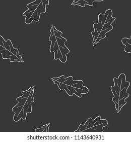 Seamless graphic design with hand drawn leaves. Fashion, interior, wrapping, packaging suitable. Repeat pattern of black and white oak leaf isolated on black
