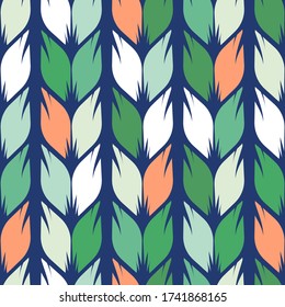 Seamless graphic pattern of color leaves on a blue background