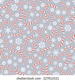 Seamless gray Christmas pattern with candy canes and snowflakes. Vector illustration