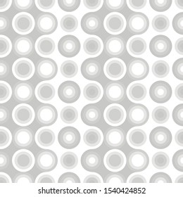 Seamless gray and white circle pattern. Background in gray tones.
