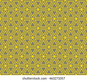 Seamless gray and yellow hexagonal ethnic pattern vector