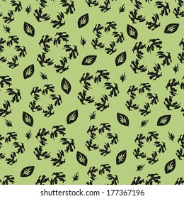seamless green background of black flowers