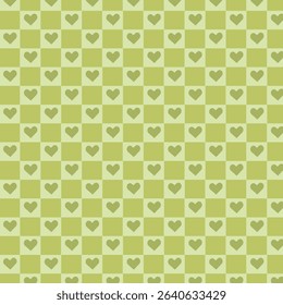A seamless green checkered heart pattern