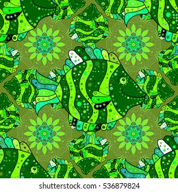Seamless green doodles and petal flowers pattern. Vector illustration. Green doodles fishes.