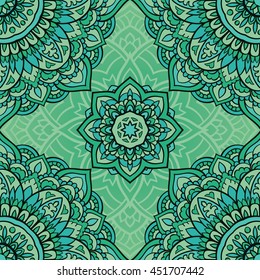 Seamless green ornamental background. Template for carpet, shawl, textile, cloth. Stylized turquoise mosaic. Filigree oriental pattern of mandalas.