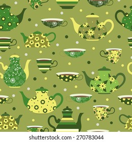 Seamless green pattern with tea cups and teapots. Vector illustration.