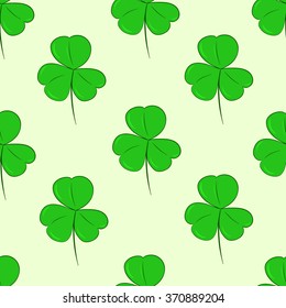 Seamless green shamrocks