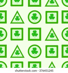 Seamless green signs of shamrocks