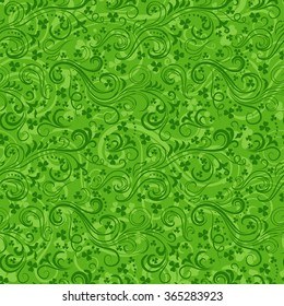 Seamless green St. Patrick's day background with floral swirls and clover leaves.