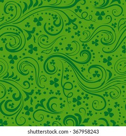 Seamless green St. Patrick's day background with floral swirls and clover leaves.