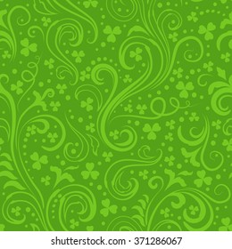 Seamless green St. Patrick's day background with floral swirls and clover leaves.