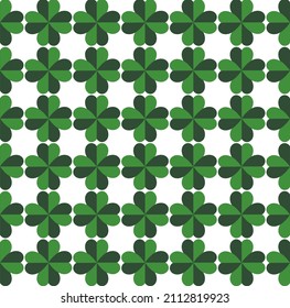 Seamless green and white clovers pattern in St. Patrick's day theme isolated on white color. Design for tile. tablecloth, gift paper, background, wallpaper and decor.