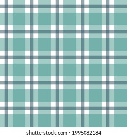 Seamless green and white tablecloth pattern. Texture from for clothes, shirts and blankets. Scottish tartan plaid. Abstract background.