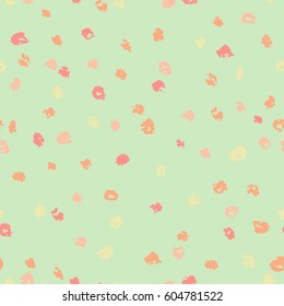 Seamless green and yellow ink dots pattern. Vector grunge background. Vector illustration.