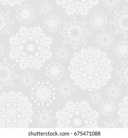 Seamless grey background with mandala pattern. Vector illustration. 
Ideal for printing on fabric or paper.
