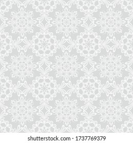 Seamless grey background with white mandala ornament in the east style. Ideal for printing on fabric or paper for textile, wrapping. Vector illustration.