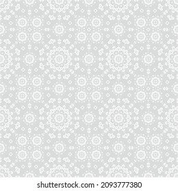 Seamless grey background with white mandala ornament in the east style. Ideal for printing on fabric or paper for textile, wrapping. Vector illustration.