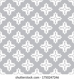 Seamless grey pattern with vintage white cross elements. Vector illustration