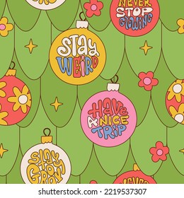 Seamless groovy pattern with spruce branches decorated with Christmas balls with hippie inscriptions and wishes. Funny retro background for Xmas design. Vector handwritten lettering illustration.