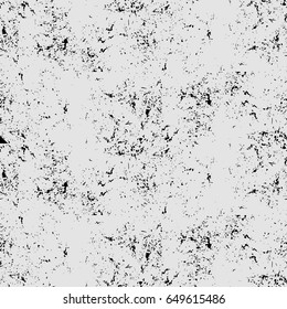 Seamless grunge pattern with small scratches, drops, dots, dust, fading. Urban design. Vector illustration. Black and gray color