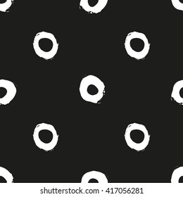 Seamless grunge polka dot  pattern. Hand painted background.