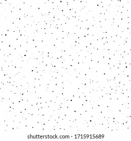 Seamless grunge texture of black speckles