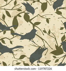 Seamless grungy vector pattern with birds and tree branches