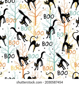 Seamless halloween cat pattern. Creative vector pattern with cat, bats, boo, trees, halloween. Funny halloween cat pattern for textile and fabric.