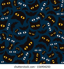 Seamless halloween cats and bats in the night background pattern in vector