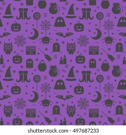 Seamless Halloween colourful violet and black pattern with festive Halloween icons. Design for wrapping paper, paper packaging, textiles, holiday party invitations, greeting card. Vector illustration.