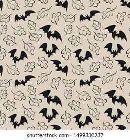 Seamless halloween pattern with bats and falling leaves on gray background for greeting card, gift box, wallpaper, fabric, web design.