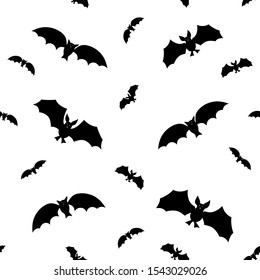 Seamless Halloween pattern with black big and small flying bat silhouettes. Kids,  boys, girls vector illustration. Happy Halloween scary Gothic background.