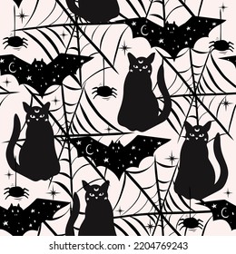 Seamless Halloween pattern with black cats, bats and spider webs.