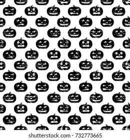 Seamless Halloween pattern with grungy pumpkins. Black on white.