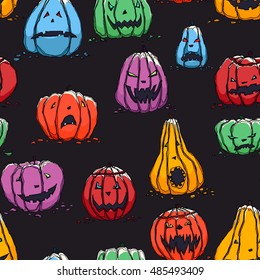 Seamless halloween pattern made of hand drawn colorful scary pumpkins.