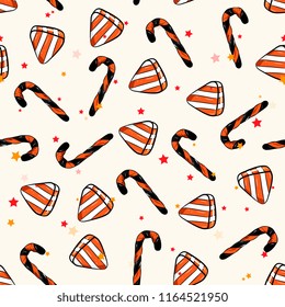 seamless halloween pattern on light background.Hand drawn Halloween traditional symbols  candles,sweet cane. Bright color background for cards, paper wrapper