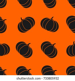 Seamless halloween pattern with pumpkin. Endless background texture for 31 october. Abstract autumn natural tiling pattern and black and orange.