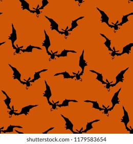 
Seamless Halloween pattern with silhouettes of bats.