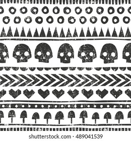 Seamless halloween pattern in tribal style. Monochrome background with grunge texture. EPS 10 vector illustration.